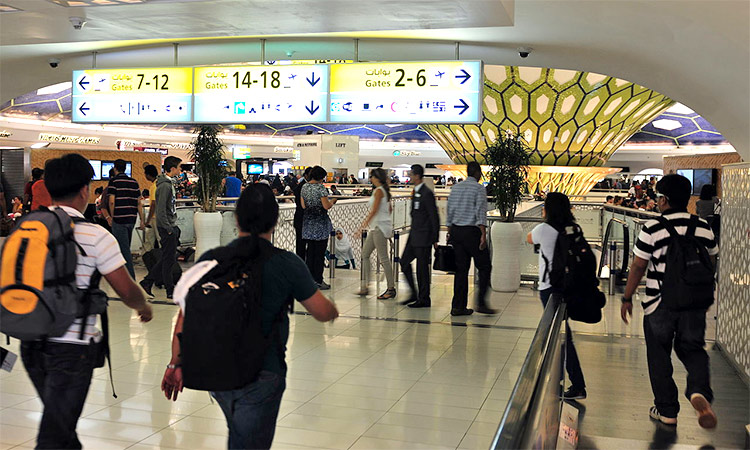 Passengers seen at the Abu Dhabi International Airport. WAM