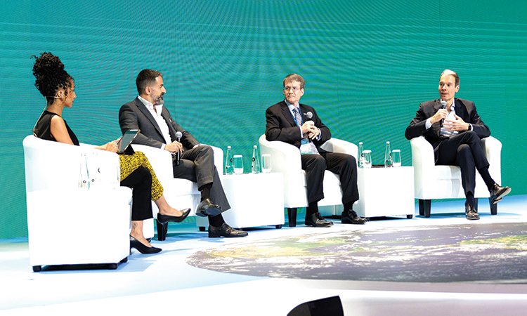 Top officials during a panel discussion  at COP28 in Dubai.