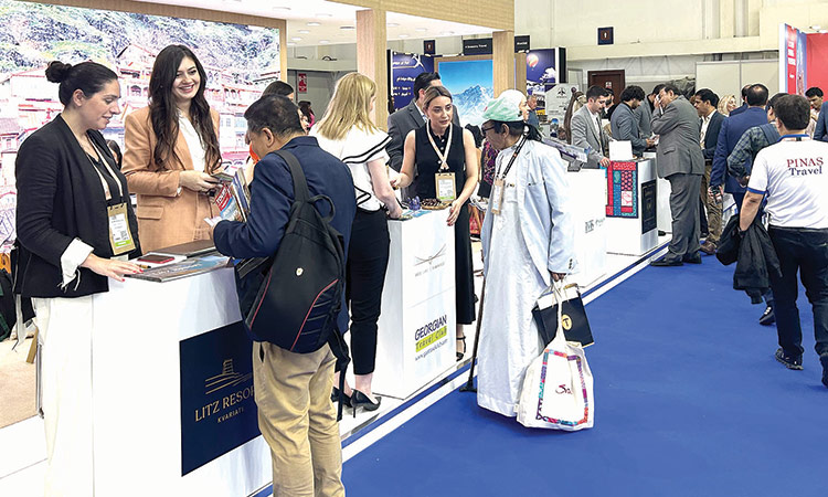 A view of exhibitors and visitors during ATM 2024 in Dubai on Thursday.