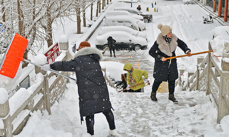 Nordic countries, Russia gripped by cold as floods hit western Europe