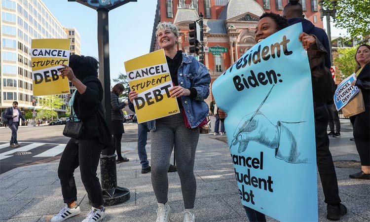 Activists call for the cancellation of student debt in Washington. Reuters