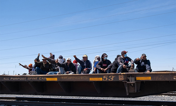 Migrant people travelling on a train arrive to Ciudad Juarez, Chihuahua state, Mexico.  Tribune News Service