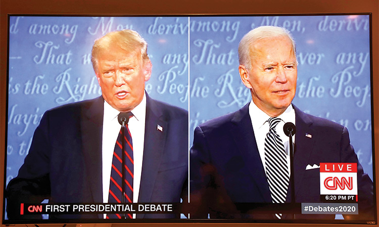 Donald Trump and Joe Biden participate in the first presidential debate at the Health Education Campus of Case Western Reserve University in Cleveland, Ohio.  File/Tribune News Service