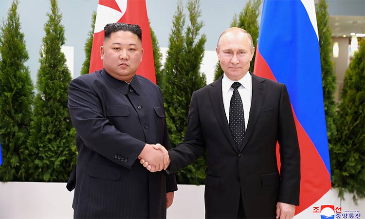 North Korean leader Kim Jong Un shakes hands with Russian President Vladimir Putin in Vladivostok, Russia. Reuters