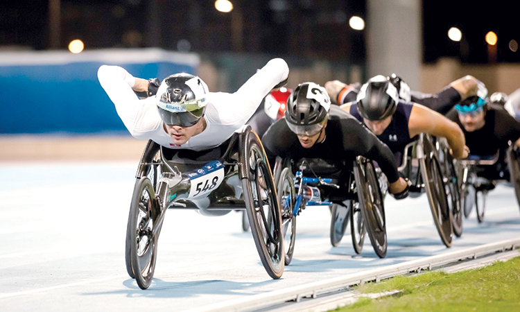 Switzerland’s Marcel Hug leads a pack of competitors in the men’s 5000m wheelchair final T54.