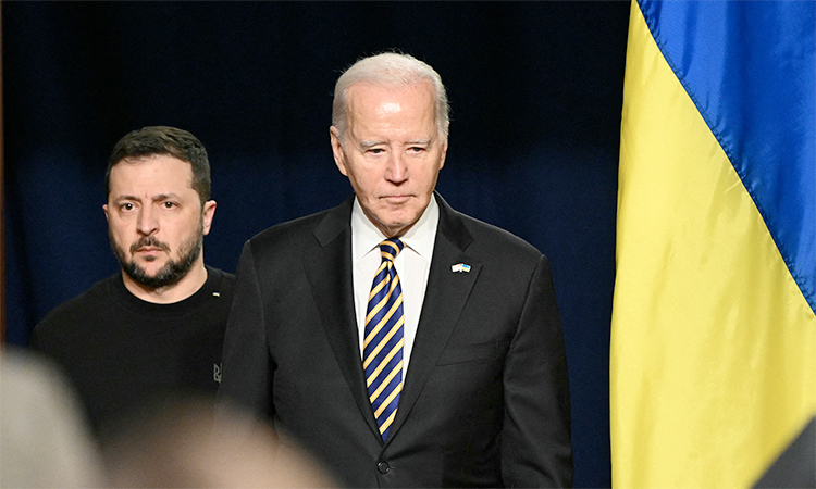 President Joe Biden and Ukrainian President Volodymyr Zelensky arrive to hold a news conference at the White House on Dec.12, 2023, in Washington. File/AFP
