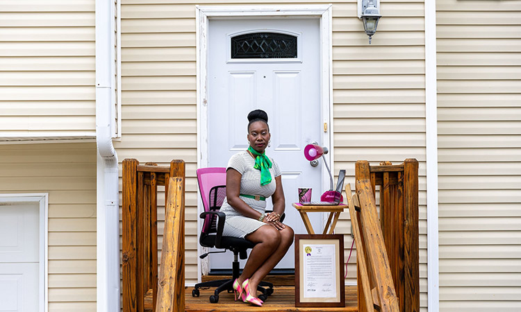 LaKlieshia Izzard, a mental health therapist, poses for a portrait at her home in Oxford. TNS