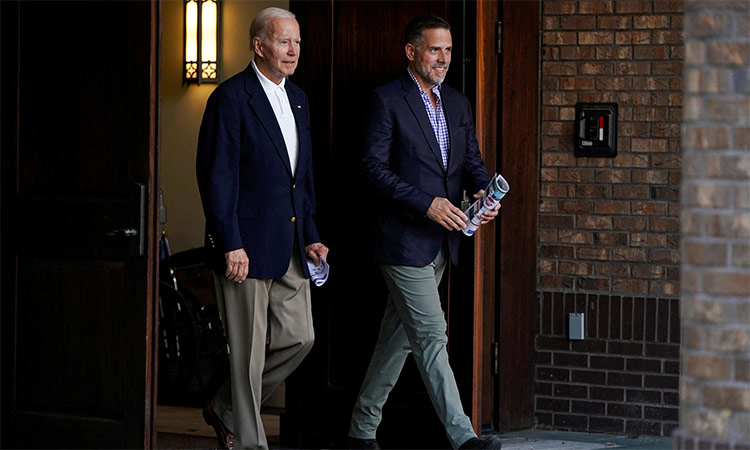  Joe Biden and his son Hunter Biden depart from Holy Spirit Catholic Church after attending Mass on St. Johns Island, South Carolina. Reuters