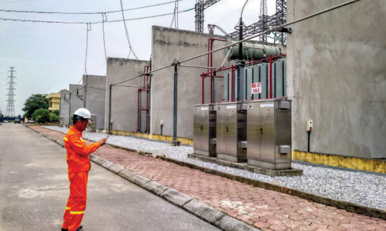 Pham Van Coung, a director of Pho Noi Power Station, works at the Pho Noi Power Station, a state utility owned by Electricity of Vietnam, in Hung Yen province, Vietnam, on June 4, 2024.  Reuters