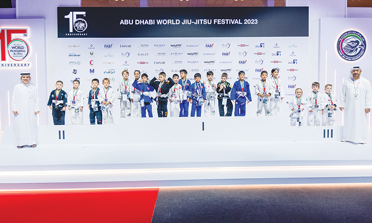 Winners pose on the podium on the opening day of the Abu Dhabi World Professional Jiu-Jitsu Championship.