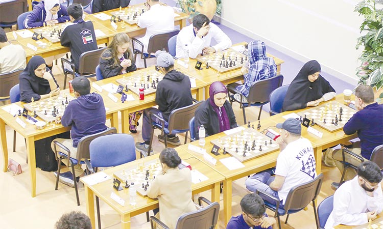 Participants in action during the second round of the Dubai Open Chess Tournament.
