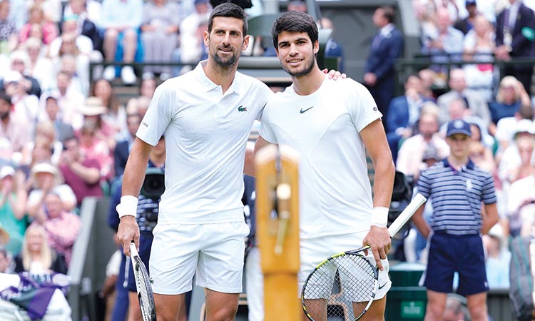 Novak Djokovic (left) and Carlos Alcaraz will be the players to watch out for at the US Open.  File
