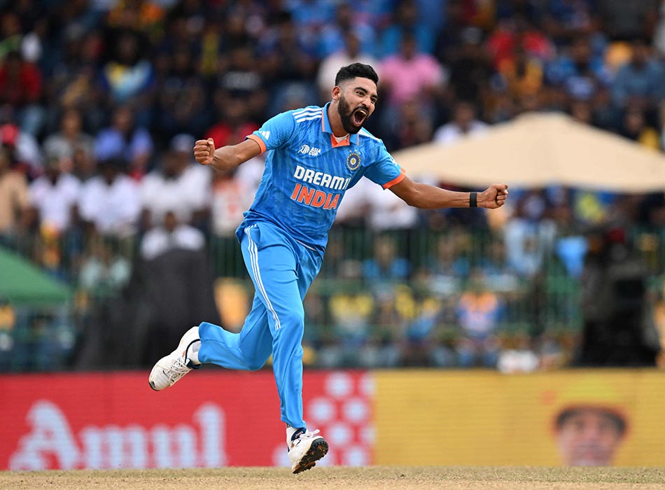 Mohammed Siraj celebrates after taking the wicket of Sri Lanka's Dhananjaya de Silva during their Asia Cup 2023 final match at the R. Premadasa Stadium in Colombo on Sunday. AFP