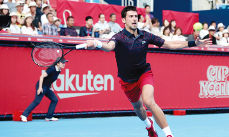 Djokovic returns to winning ways in Japan after injury