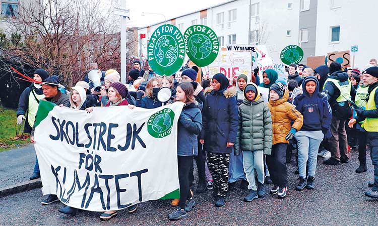 Thousands rally demanding action on climate crisis