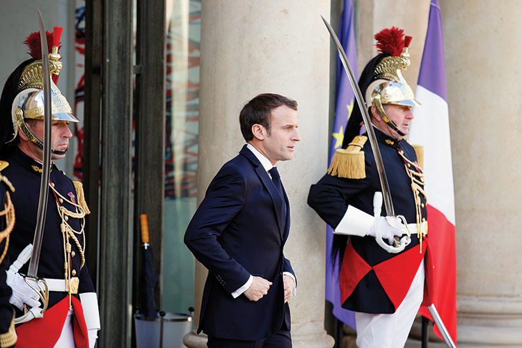 Macron holds first rally as France election race tightens