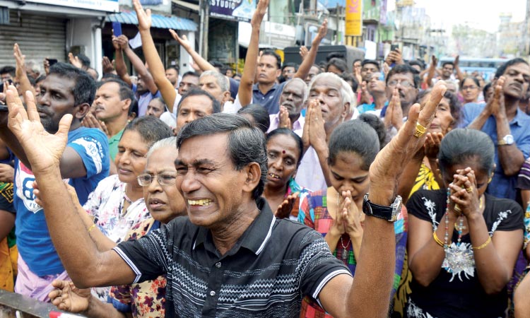 Security boosted as Lanka  mourns suicide blast dead