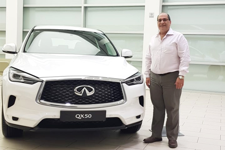 Mother buys Dubai Shopping Festival gift raffle ticket for son, wins Infiniti QX50, Dhs200,000 