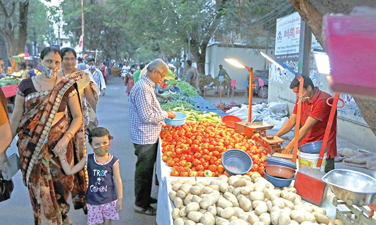 Indian government trims tax  on fuel to fight rising inflation