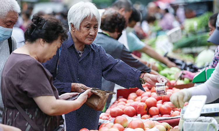 China’s factory inflation eases in  July, consumer prices speed up