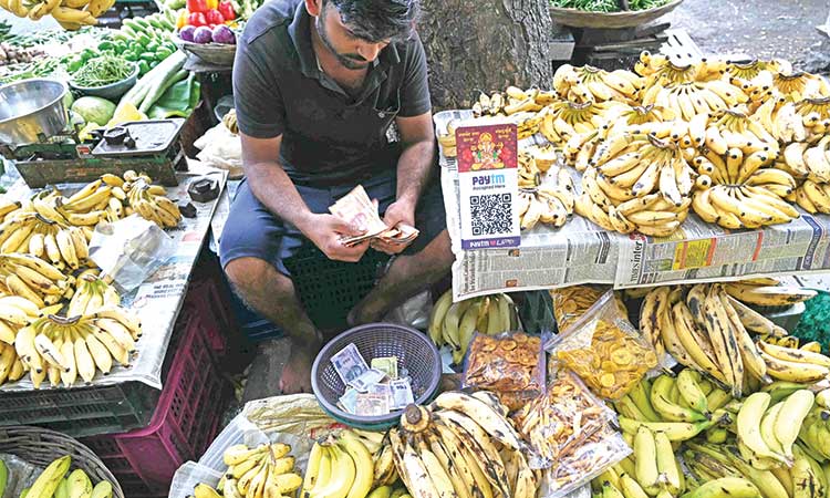 India’s RBI holds rates; signals   tight policy on inflation worries