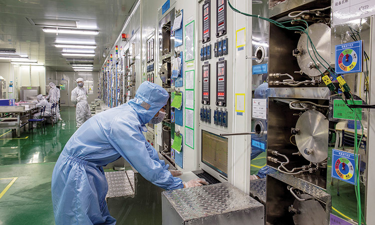 Chipmakers supply glut easing  but demand recovery still slow