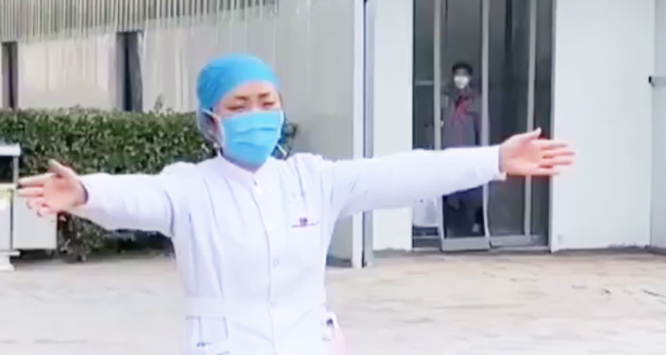 Video of a nurse who treats coronavirus patients miming a hug to her daughter, goes viral