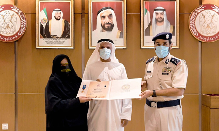 Abu Dhabi Police honour Emirati woman for her community services