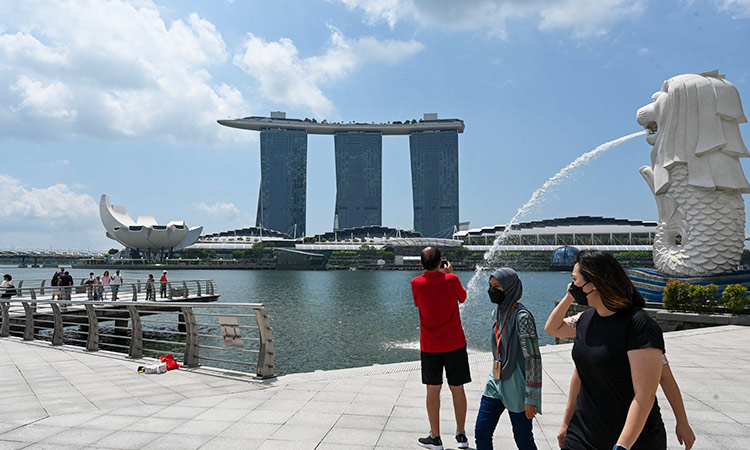 Singapore to lift virus travel curbs in 'milestone'