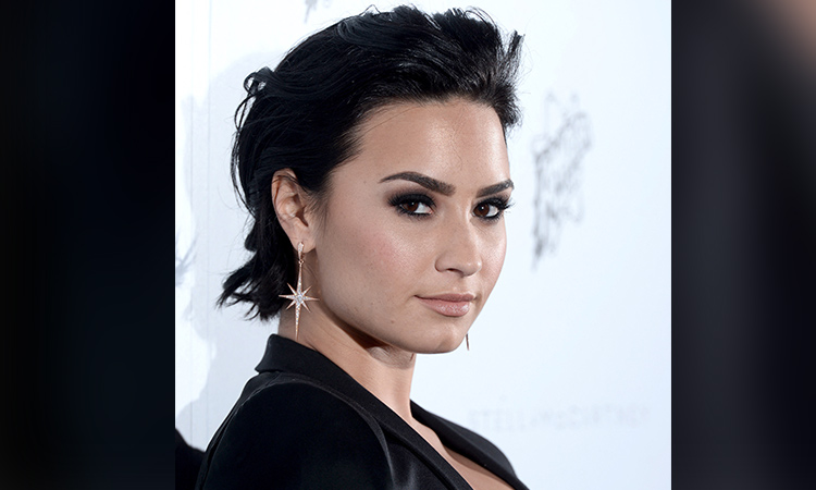 Singer Demi Lovato details how she hit her head on a crystal