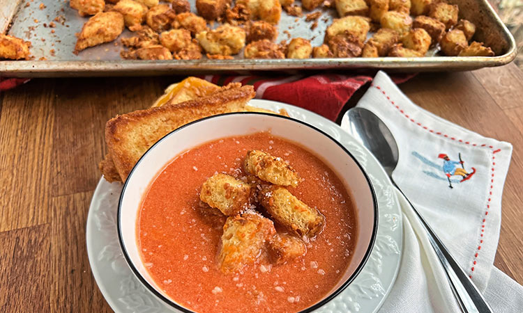 Homemade tomato soup with cheesy croutons