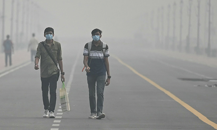 Masks are back, construction banned and schools shut as toxic air engulfs New Delhi