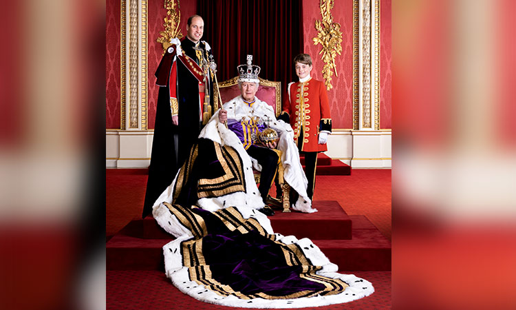 Charles marks coronation with photograph alongside heirs William and George