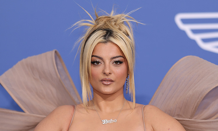 Bebe Rexha rushed off stage after phone hits her on the face