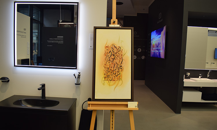 Narjes Noureddine shows calligraphy at Ideal Standard for Emirati Women’s Day