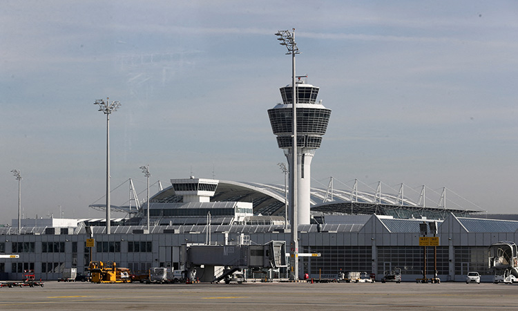 Climate activists glue themselves at Munich airport to protest pollution caused by flying