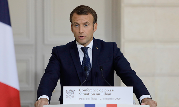 Macron cuts diminished figure in shake-up