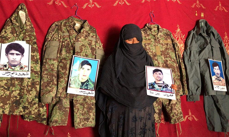 Afghan woman prays that peace will save her fourth husband