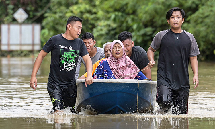 Over 26,000 evacuated as floods hit Malaysia again