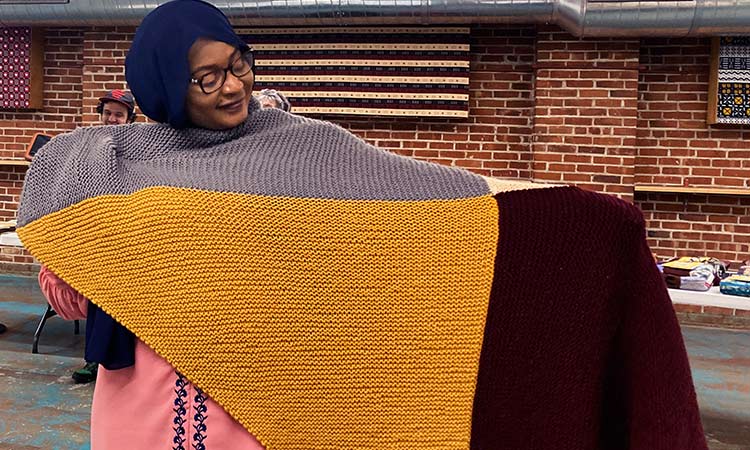 Handmade blankets welcome refugees, immigrants to US