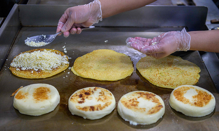 Venezuela's 'daily bread,' humble arepa conquers the world