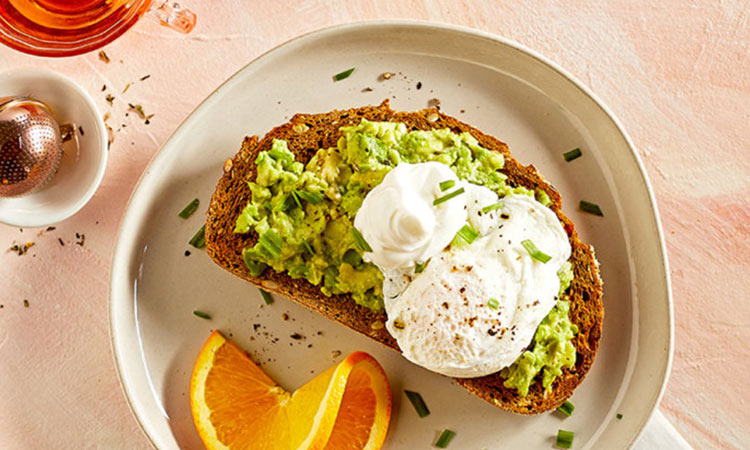 Avocado toast with poached egg and chilli salt