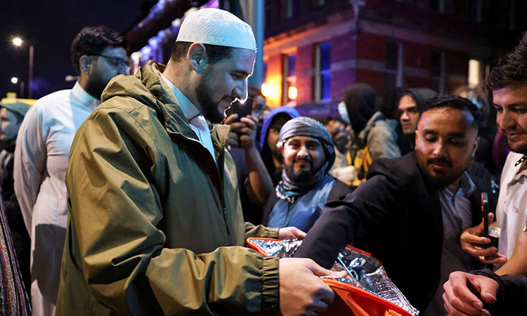 UK imam invites protesters for burgers, chips as hundreds of mosques step up security