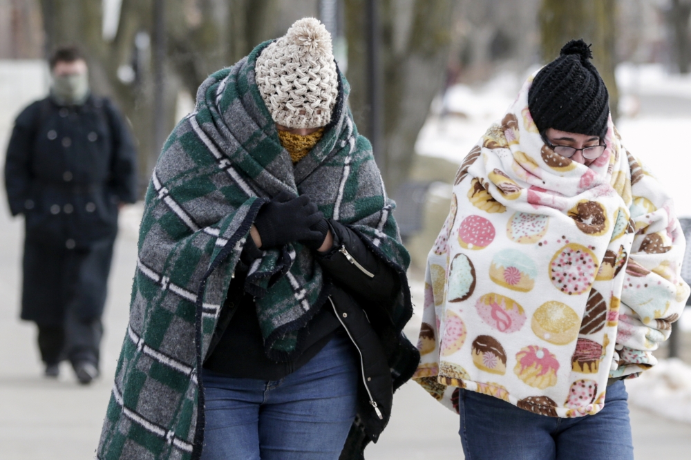 Deep freeze grips US Midwest, blamed for at least 12 deaths