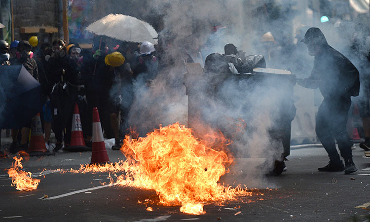 Police shoot Hong Kong protester in chest during clashes