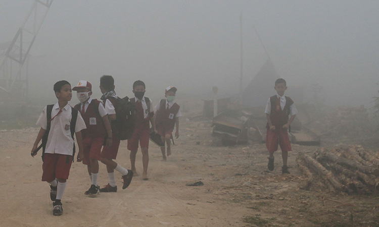 Hazy conditions force Indonesia to shutter schools over children's health concerns