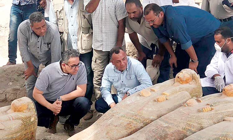 Archaeologists uncover 20 ancient coffins