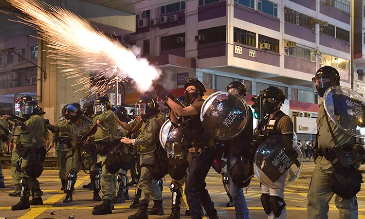 Hundreds of shops trashed as Hong Kong police, protesters clash