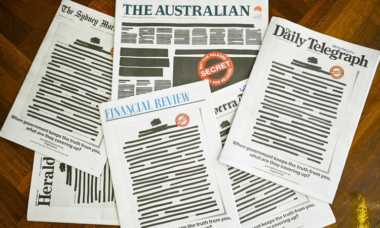 Australian papers hit out at curbs on media freedom with blacked out front pages