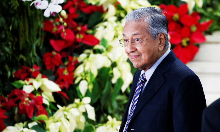 Malaysia could be hit with sanctions amid US-China trade war, says PM Mahathir